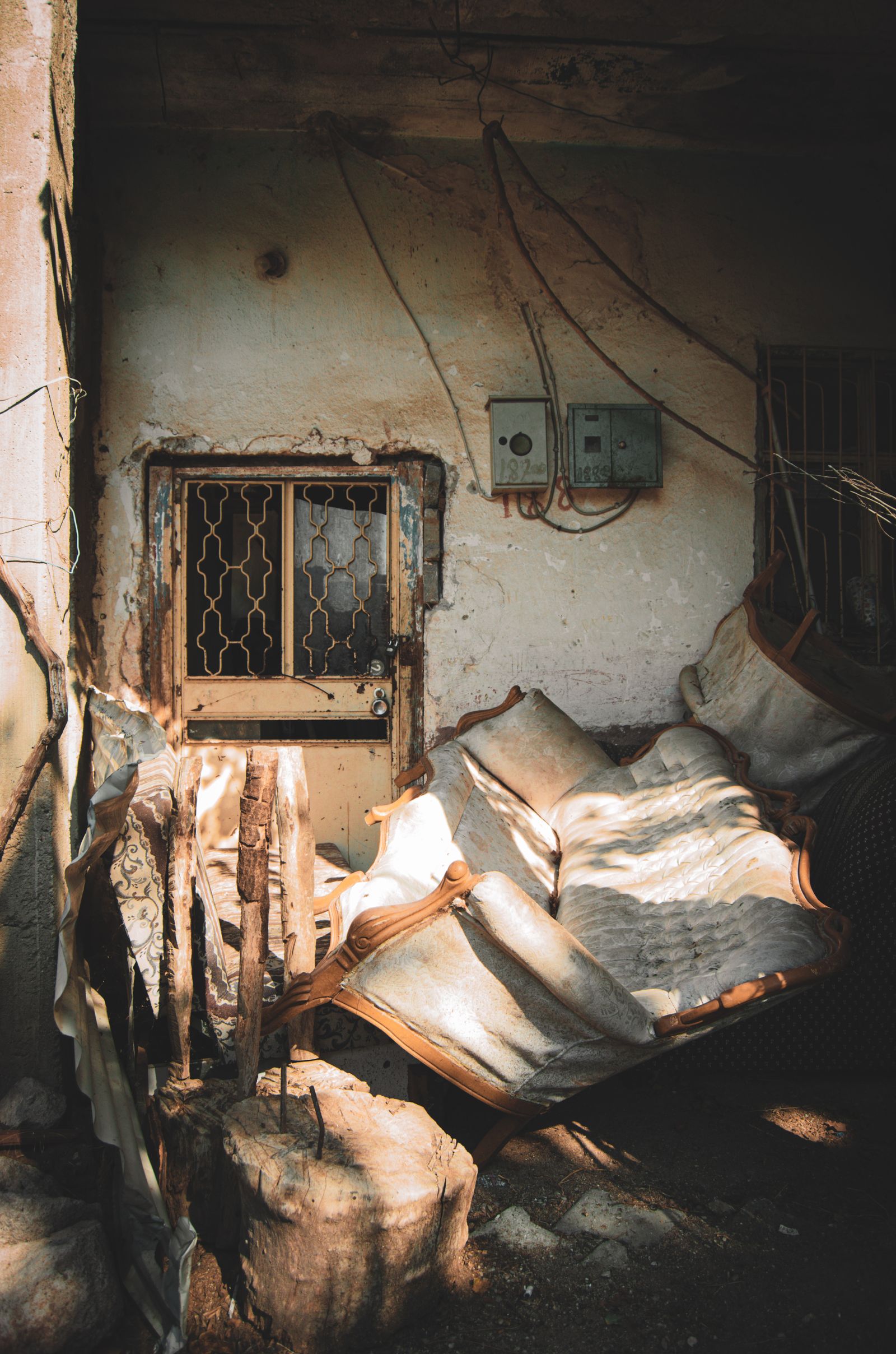 Old house interior with furniture and belongings left behind